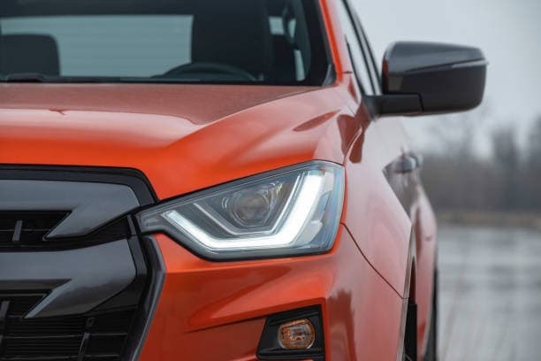 Orange Isuzu D-Max truck front view